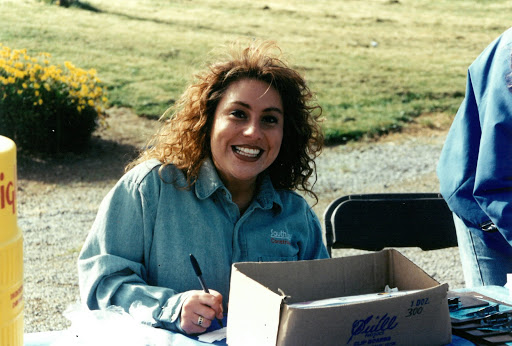 woman sitting at table for SBC